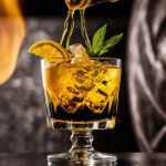 Default_create_photos_of_cocktails_and_beverages_to_gold_and_b_1